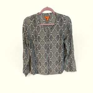 A Joe Fresh blouse in size large